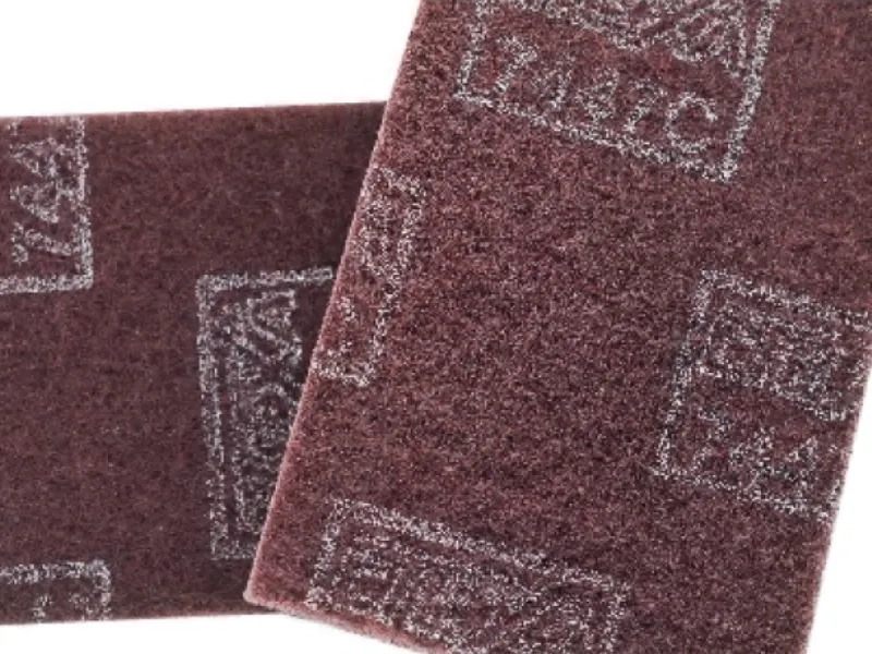 Vlies-Scheuerrollen und -Pads